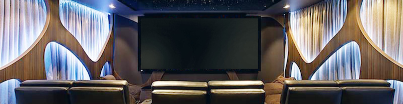 A big screen television in a home theater