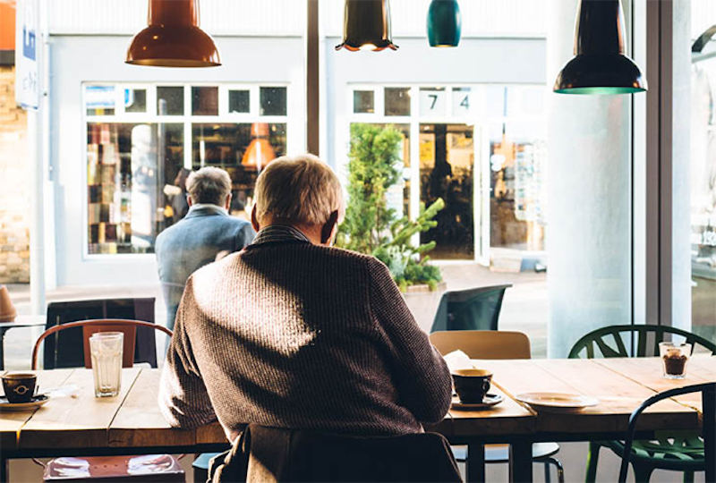 A man sits in a cafe