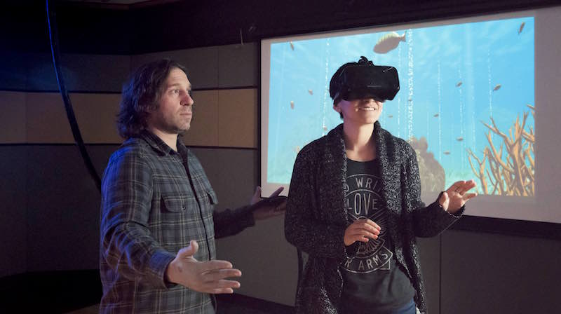 a VR user walks through one of the lab’s custom interactive programs.