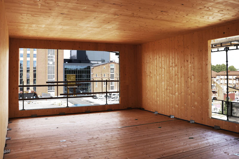 Unfinished interior room in mass timber building